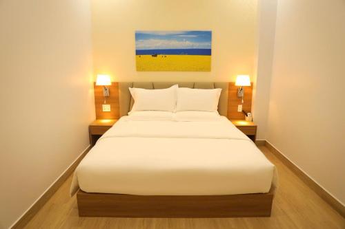Ellman Hotel - 艾尔曼酒店にあるベッド