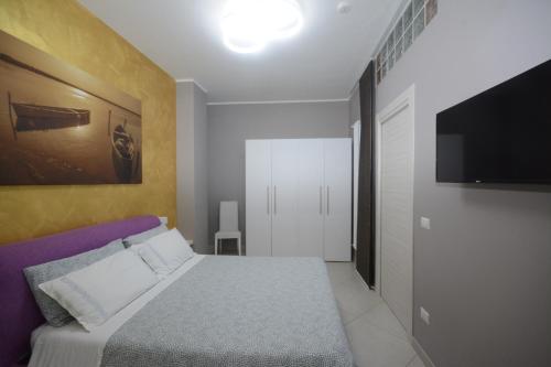 Postel nebo postele na pokoji v ubytování Al Vecchio Fontanile