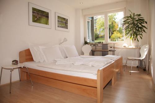 Кровать или кровати в номере Apartment Spacious Liman