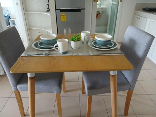 Una cocina o zona de cocina en Mike's Place at Marina Spatial