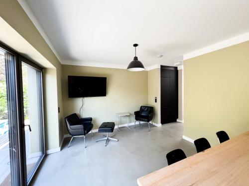 TV a/nebo společenská místnost v ubytování Wohnung Hannes