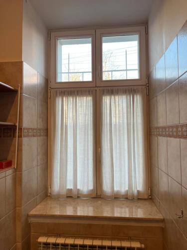 Ένα μπάνιο στο Home in Krakow Silvio's Apartments