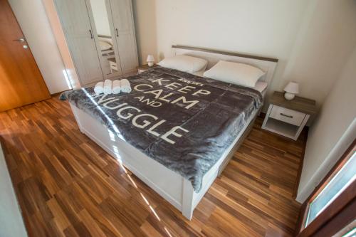 Ένα ή περισσότερα κρεβάτια σε δωμάτιο στο Apartment Duda