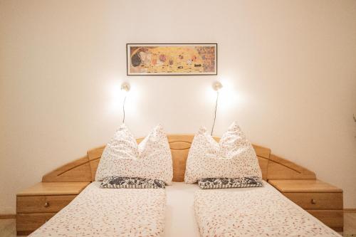 Postel nebo postele na pokoji v ubytování Gästehaus Wechselberger