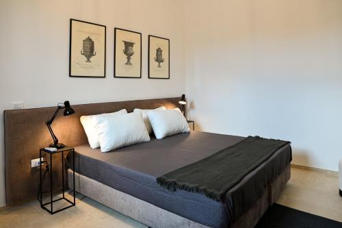 Postel nebo postele na pokoji v ubytování Palazzo Sottil