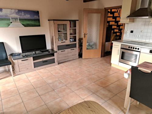 Η κουζίνα ή μικρή κουζίνα στο Ferienwohnung 898 in Burhave