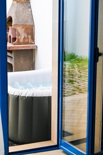 Postel nebo postele na pokoji v ubytování La casa azul - Jacuzzi clima netflix -