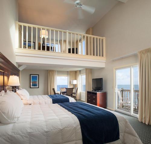Katil atau katil-katil dalam bilik di Ocean Mist Hotel