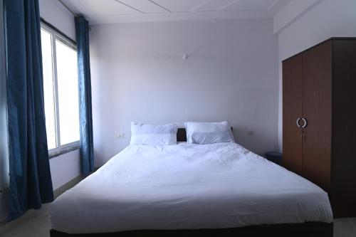 Postel nebo postele na pokoji v ubytování Ima Retreat