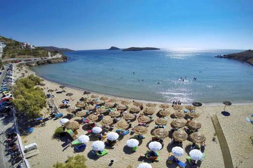 an overhead view of a beach with umbrellas and the ocean at Love Limni No 1 in Peaceful Poseidonia in Posidhonía