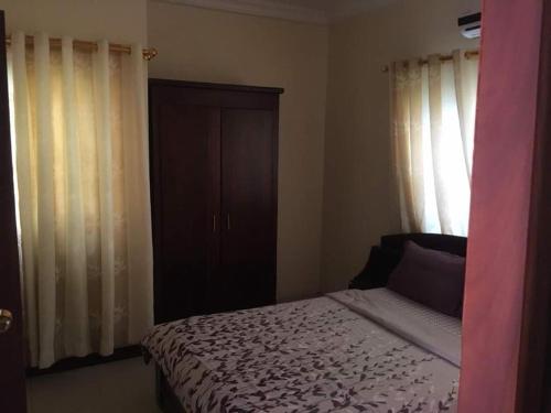 Postel nebo postele na pokoji v ubytování Beach Road Apartments