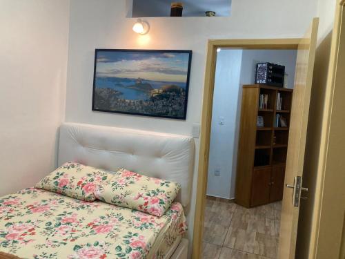 Katil atau katil-katil dalam bilik di Lofts de luxo no Palácio Quitandinha