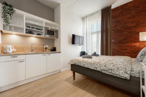 Η κουζίνα ή μικρή κουζίνα στο Modern Studio Next to Old Town