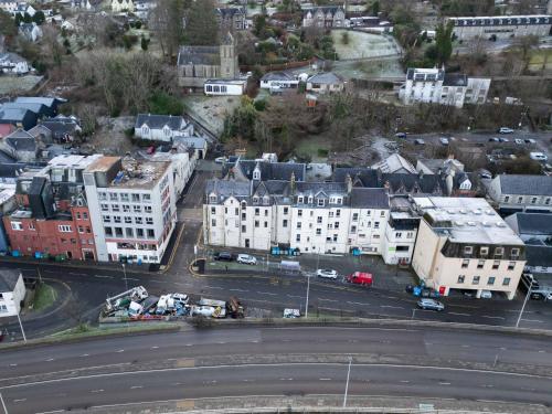 an aerial view of a city with buildings and a street at Prime location rooms in high street in Fort William