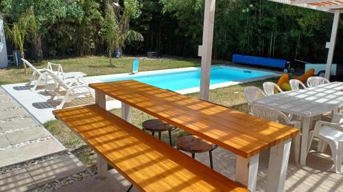 Πισίνα στο ή κοντά στο Lua del plata, casa con piscina climatizada