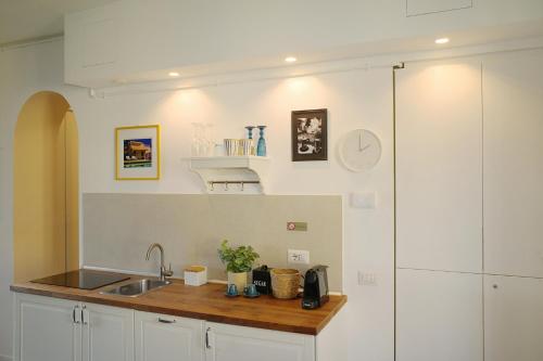 Kuchyň nebo kuchyňský kout v ubytování Ripa Apartments Milano - Via Vigevano Navigli