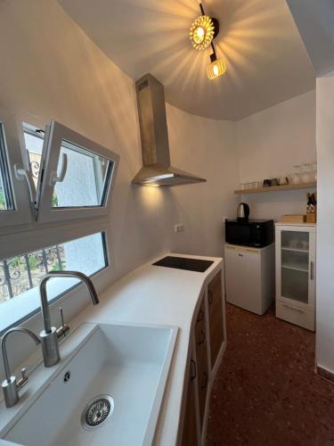 Η κουζίνα ή μικρή κουζίνα στο Villa el Paraiso