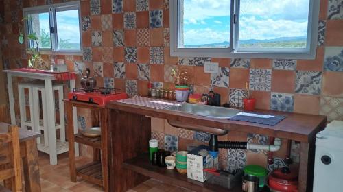 Kuchyň nebo kuchyňský kout v ubytování Hostal El Portillo