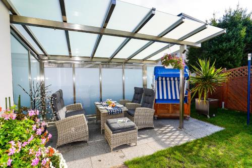 Κήπος έξω από το Haus Strandperle Bungalow