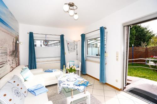 Κήπος έξω από το Haus Strandperle Bungalow