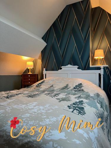 Ένα ή περισσότερα κρεβάτια σε δωμάτιο στο Cosy Mimi a Charming home