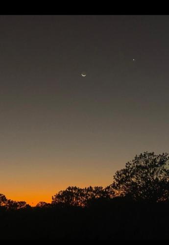 an image of a sunset with the moon andupiter at Beach cabin ometepe in Altagracia