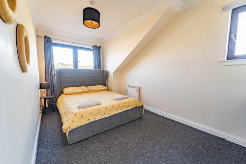 Postel nebo postele na pokoji v ubytování Ben View Apartments Flat A