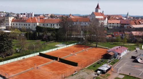 an overhead view of a tennis court in a city at Apartmány Naxarův dvůr in Horažďovice