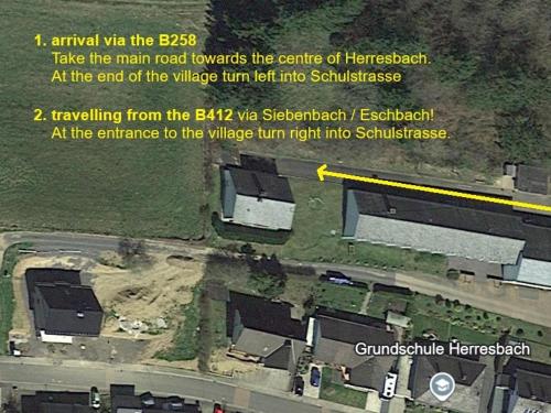 a map of a parking lot with a building at RINGZEIT-Lodge in Herresbach