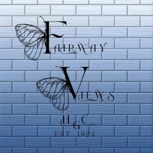 a drawing of a butterfly on a brick wall at Fairways View at Haverfordwest Golf Club in Haverfordwest