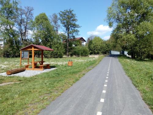 a road with a gazebo on the side at Apartmány Naxarův dvůr in Horažďovice