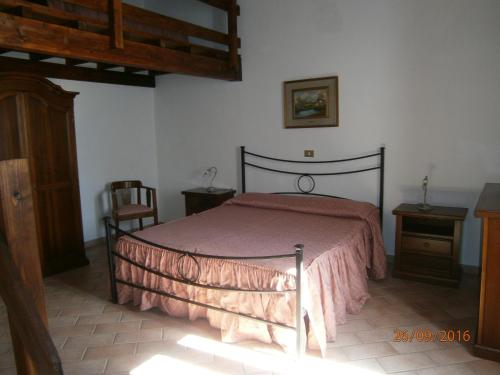 Ένα ή περισσότερα κρεβάτια σε δωμάτιο στο Casa Marianella 2