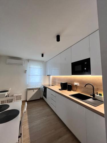 Η κουζίνα ή μικρή κουζίνα στο Apartman Hapač