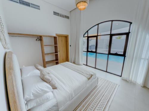 Cama o camas de una habitación en 10 Pool Villa