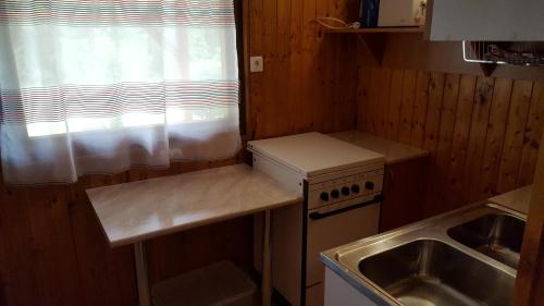 Kuchyň nebo kuchyňský kout v ubytování Kéri Apartman