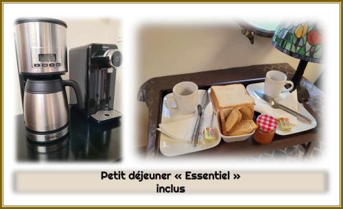 a table with a plate of food and a coffee maker at Péniche Amboise Maison d'Hôtes Flottante Toulouse Centre in Toulouse
