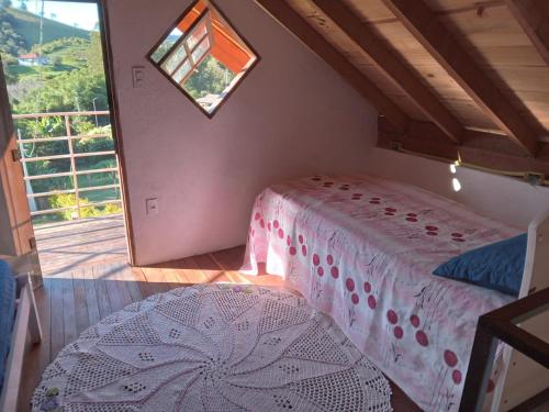 Postel nebo postele na pokoji v ubytování Cabana D Bem K Vida