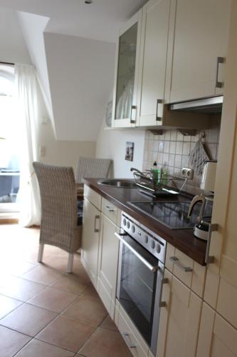 Η κουζίνα ή μικρή κουζίνα στο Godeke Michels Ferienwohnung 24 Seestr5b