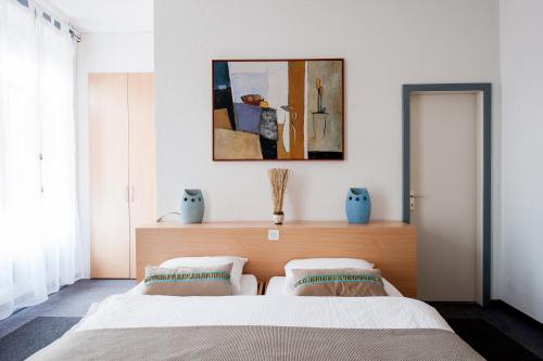 Postel nebo postele na pokoji v ubytování Hotel Acacia