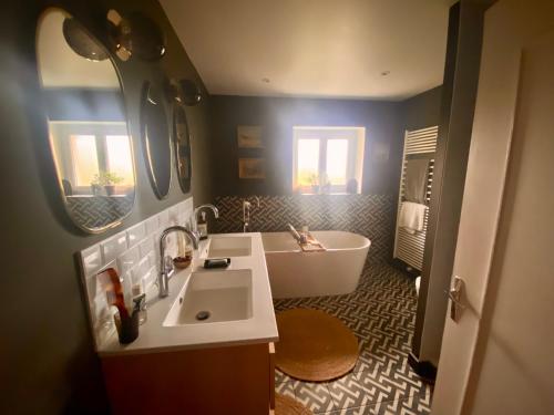 Koupelna v ubytování 2 Chambres, spéciales 24H DU MANS