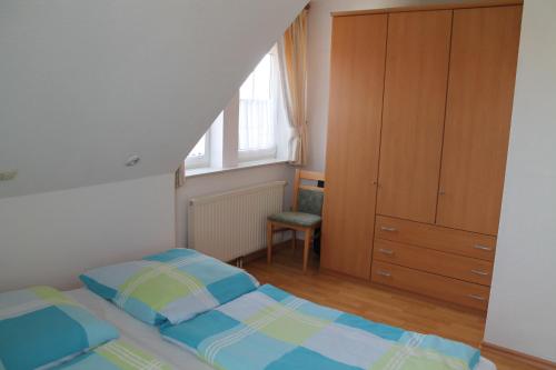 Un ou plusieurs lits dans un hébergement de l'établissement Ferienhaus Pia