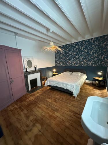 Voodi või voodid majutusasutuse A 600m de la plage 6pers Meublé de tourisme 3 étoiles La Villa des Grottes toas