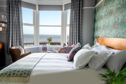 Ένα ή περισσότερα κρεβάτια σε δωμάτιο στο The Broadwater Guest House