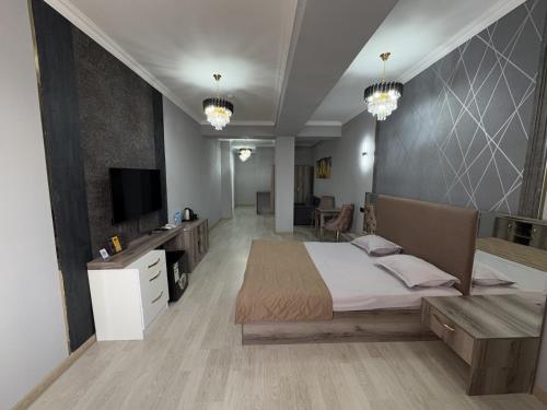 Katil atau katil-katil dalam bilik di Stela Hotel