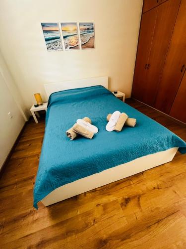 Postel nebo postele na pokoji v ubytování Sofia`s place