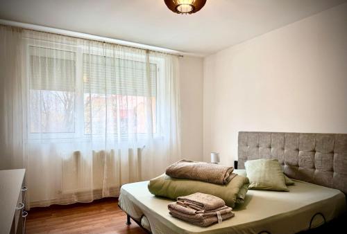 Un pat sau paturi într-o cameră la Venus Resort