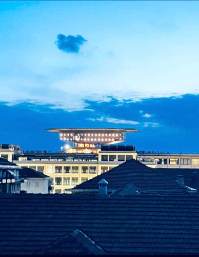 a large building with an object on top of it at Golden House-Super View On Turin in Turin