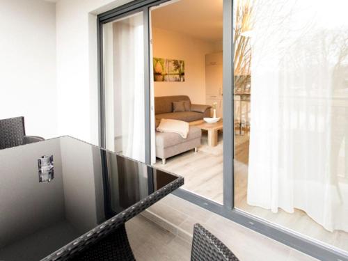 Ένα ή περισσότερα κρεβάτια σε δωμάτιο στο Appartements mit Blick auf die Spree in Lübben
