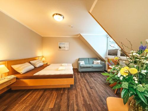 Postel nebo postele na pokoji v ubytování Haus Leuchtfeuer
