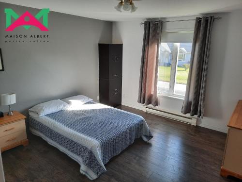 Postel nebo postele na pokoji v ubytování Maison Albert